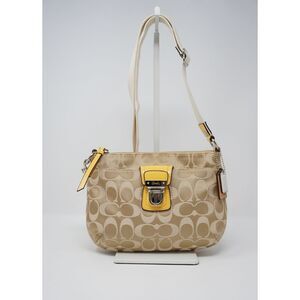 Coach Poppy Khaki Signature Sunflower Yellow Patent Leather Crossbody Swingpack